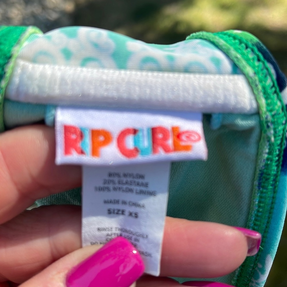 Rip curl bikini, top, shades of blue and green and white.